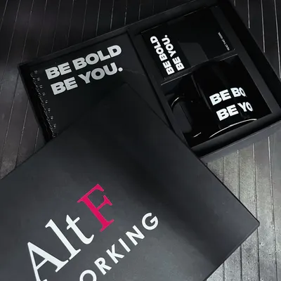 A closer look at the custom gift box we designed for Alt F Coworking. The sleek black box features their logo, and inside, a branded notebook and mug carry a simple, powerful message: 'Be Bold. Be You.'