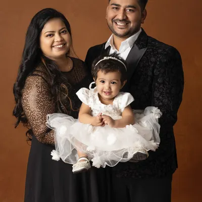 A beautiful family portrait, with their little star shining brightly. I love creating these classic, elegant images that freeze a moment of pure happiness and love.