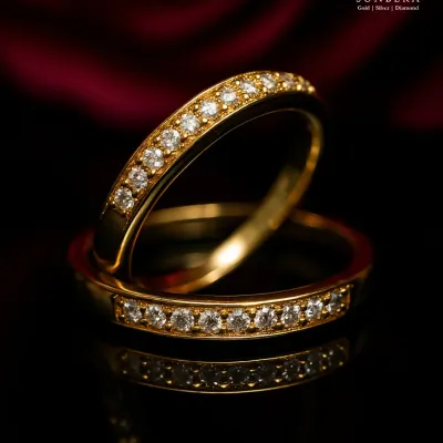 These elegant couple rings feature a band of channel-set diamonds in polished gold. The timeless design is perfect for engagements, anniversaries, or simply as a beautiful symbol of your commitment.