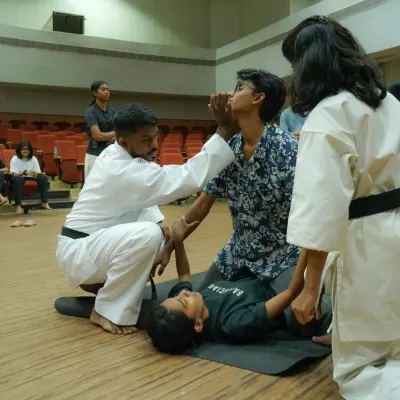 We teach you how to handle situations where you are outnumbered or on the ground. This drill simulates a multi-person threat, focusing on ground defense, creating space, and getting back to your feet.