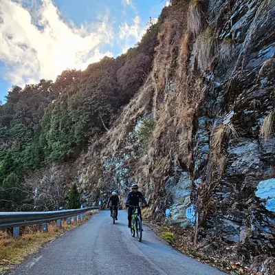 Two riders enjoying the quiet, scenic roads of Uttarakhand. Our Kumaon tours are designed to show you the hidden beauty of this state, away from the crowds.