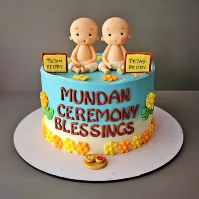No hair, don't care! A special chocolate truffle cake for the Mundan ceremony of twin boys, Tejan and Tejas. The cake features cute, bald baby figurines and traditional elements.