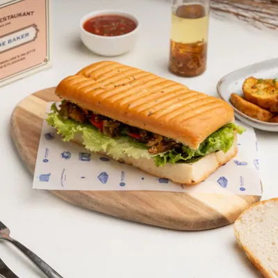My Pesto Grilled Vegetable Focaccia sandwich. I pack freshly grilled vegetables and flavorful pesto into my soft, house-made focaccia bread.