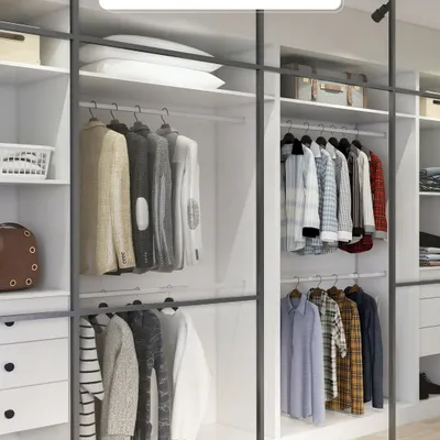 Natural light meets thoughtful design in this well-organized closet. I used a combination of hanging space, drawers, and open shelving to ensure every item has its place, making it easy to see and access your wardrobe.
