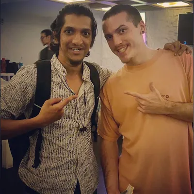 Hanging out with NME, another talented beatboxer, at a competition. The beatbox community is tight knit, and these events are a great place to learn from and get inspired by other artists.