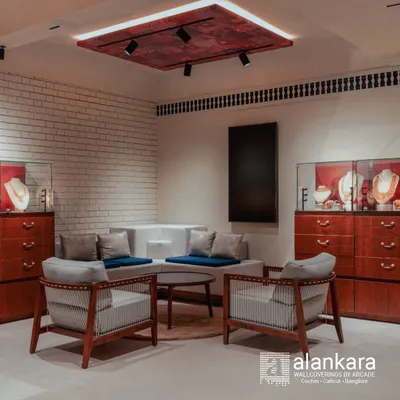 A complete interior solution for a high-end commercial client. We designed and installed the seating, display cabinets, and even the textured ceiling panel to create a cohesive and luxurious brand experience.