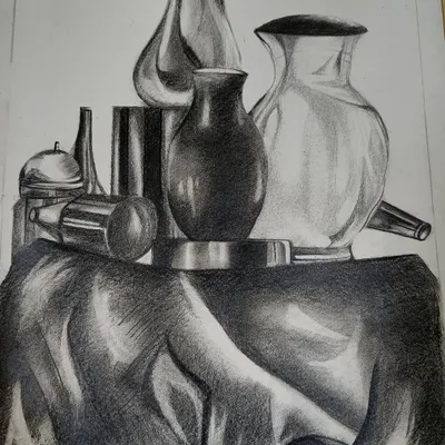 A classic still life sketch done with charcoal pencils. I focused on realistic shading to show the different textures of the fabric and the reflective surfaces of the vessels.