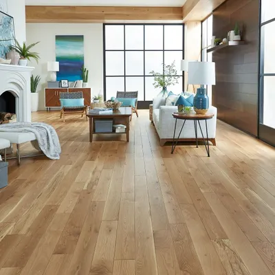 This is my go-to look for a modern, sun-filled living room. The wide planks of light, natural wood flooring amplify the natural light and create an atmosphere that is both expansive and inviting.