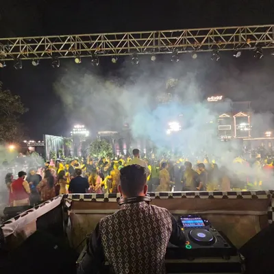 This is the view I live for. From my console, I see the energy build until the entire dance floor is one single vibe. This is my goal for every Sangeet, reception, or party I play.