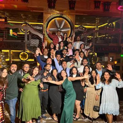 The best part of my job is the connections I make. This group photo is with a wonderful client, and the testimonial they sent shows the impact of my work. My goal is to leave a mark on everyone's heart.