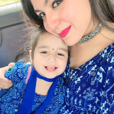 A happy moment with my daughter, twinning in our blue bandhani print outfits. Matching with her is one of my greatest joys.