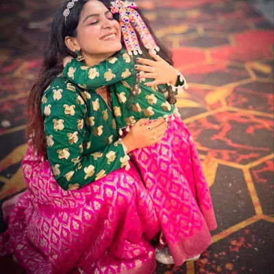 A heartwarming moment with my daughter, both of us wearing the matching ethnic outfits I designed from an old silk saree. This project was all about recycling with love.