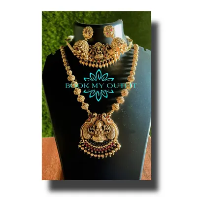 This is a classic temple jewelry set that I offer for rent. It features a traditional goddess motif on both the choker and the longer necklace, perfect for pairing with a silk saree for a traditional function.