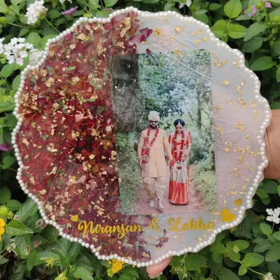 This is one of my favorite commissions. I preserved a couple's wedding varmala and photo in this beautiful resin plaque, creating a lasting memory of their special day.