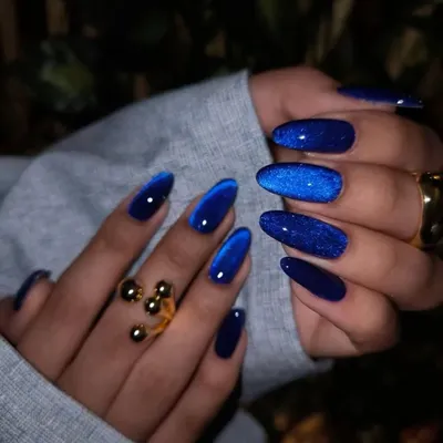 Turning Monday blues into manicure hues. This stunning royal blue cat-eye effect is deep, vibrant, and has a mesmerizing shimmer. It's the perfect way to make a bold statement.
