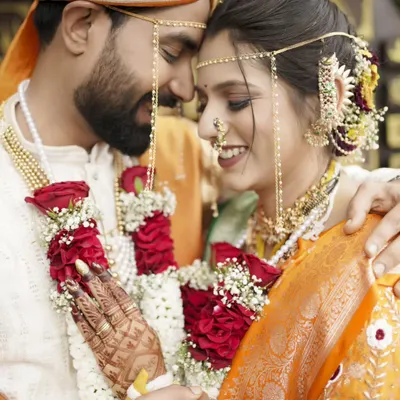 A beautiful close-up, capturing the intimacy and affection between the newly married couple.