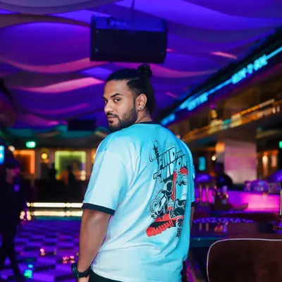 A shot from a club night, capturing the calm before the storm. My work is about more than just DJing; it's about understanding the space, the crowd, and the night to create a unique vibe.
