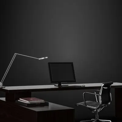 A minimalist executive desk setup designed for focus and clarity. The clean lines of the desk, the ergonomic chair, and the adjustable task lamp create a functional and uncluttered environment, perfect for a modern office.