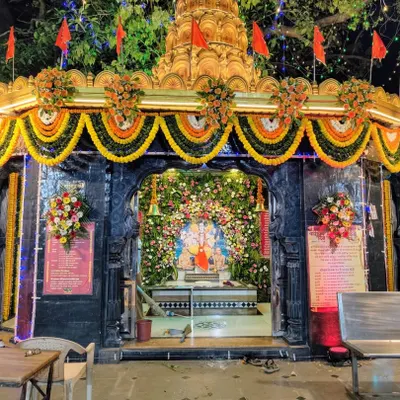 This is a grand decoration we designed for the Sai Baba Mandir in Malad. The entrance is adorned with traditional marigold garlands and vibrant flower arrangements, creating a magnificent and welcoming atmosphere for devotees.