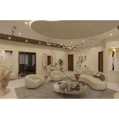This living room design features soft, curved furniture in neutral tones, creating a gentle and inviting atmosphere. The organic shape of the false ceiling with cove lighting adds a unique architectural element to the space.