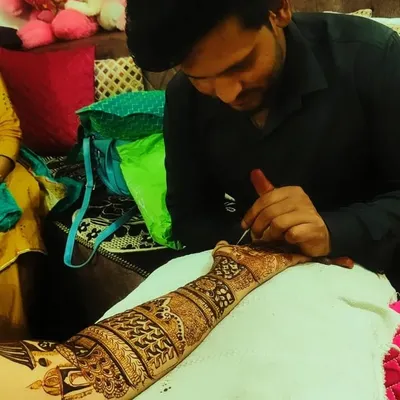 This is me, focused on the details. I personally oversee the quality of work to ensure every bride gets the best.