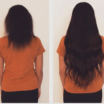A stunning 28-inch transformation with natural waves. This shows how we can add incredible length while maintaining a soft, flowing, and voluminous texture.