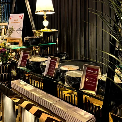 Our live Teppanyaki station is a centerpiece of culinary entertainment. Set against a chic, modern backdrop, this station offers guests a taste of authentic Japanese grilled delicacies, prepared right before their eyes.