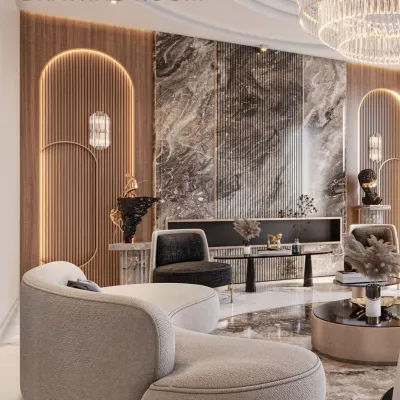This drawing room is defined by curves, textures, and light. We designed a sculptural ceiling and sourced curved seating to create a sense of circular harmony, while the feature wall of book-matched marble and fluted panels adds dramatic texture.