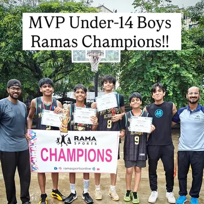 The moment our Under-14 boys became Ramas Champions. You can see the pride and joy as they hold up the trophy, certificates, and the official champions banner with the coaches.