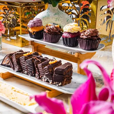 Ready to satisfy your sugar cravings? Our dessert platters feature a mix of chocolate pastries and assorted cupcakes.
