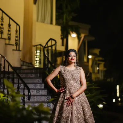 Smokey eyes and a bold red lip are a classic, can't-go-wrong combination for a sangeet night. This bride looks absolutely stunning and ready to dance.
