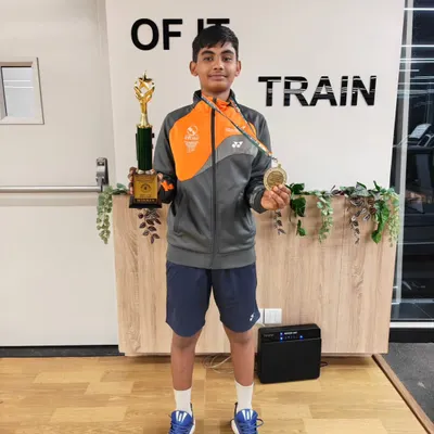 Here is Jashwant, the U-13 Badminton National Champion, with his trophy and medal. This victory is a testament to his hard work and the effectiveness of our cross-sport athletic performance program.
