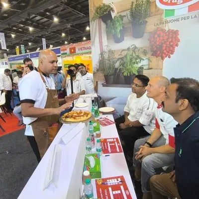 Here I am at the All India Pizza Championship, presenting my creation to the judges. It was a nerve-wracking but incredible experience to share my passion and techniques on a national stage.