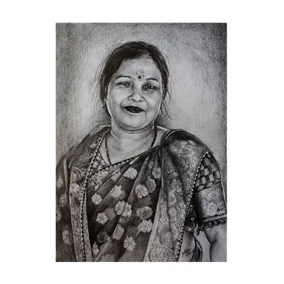 A finished A4 graphite sketch capturing a warm, gentle smile. The soft shading in the background helps the portrait stand out, and I paid close attention to the fabric details of her saree.