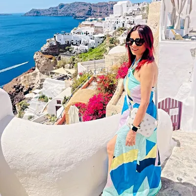 My fits are traveling the world! Here's a dress I designed for my client's lovely Greek vacation. The vibrant colors look stunning against the Santorini backdrop.