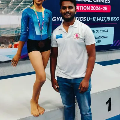 A proud moment at the ISSO National Games, celebrating a second-place finish on the vault for our U11 gymnast. Our competitive program is designed to prepare athletes for high-level events.