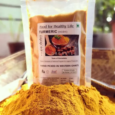 A close-up of my organic turmeric powder. The vibrant color and fine texture are signs of its purity, sourced directly from the Western Ghats to provide an authentic taste of Karnataka in your food.