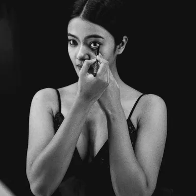The quiet focus of preparation. This series was inspired by the backstage moments before a performance, capturing the transformation into character.