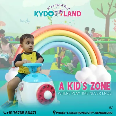 Our dedicated kid's zone where playtime never ends. This little one is enjoying a ride on one of our popular toddler-friendly toys.