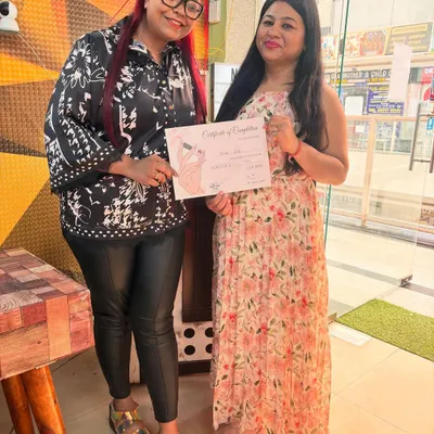 Another happy student receiving her professional nail art certification. My goal is to empower you to start your own business, and this is the first step.