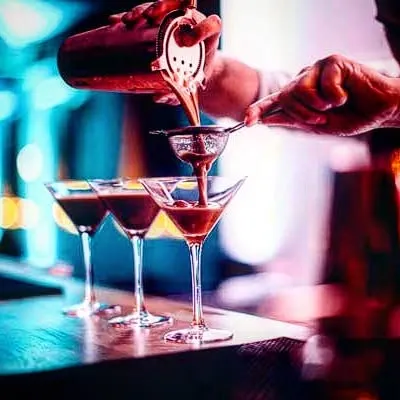 The 'After Eight' Martini is a perfect example of a signature drink. I help bars develop unique cocktails like this, which become a core part of their identity. We focus on balancing unique flavors, presentation, and cost-effectiveness.