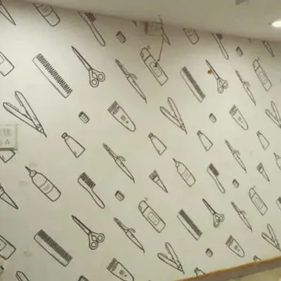A fun and stylish wallpaper for a hair salon, featuring a pattern of scissors, combs, and other styling tools. This is a great way to reinforce your brand and create a themed environment.