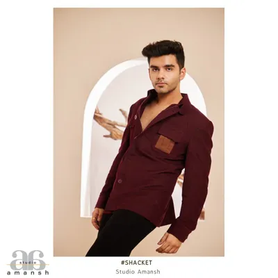 Our maroon shacket, a perfect blend of sophistication and laid-back style. This full-length shot shows its modern cut and how it can be worn for a sharp yet relaxed look.