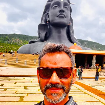 At the feet of Adiyogi, offering myself in gratitude and devotion. My spiritual practice is the foundation of my life and work, providing the stillness and energy that I bring to my coaching sessions.