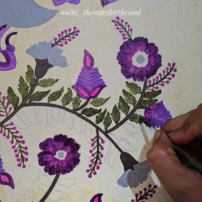 A close-up, work-in-progress shot of a Kalamkari-style painting. This shows the careful, hands-on process of building up layers of color and detail with a fine brush, which is the soul of all my handmade art.