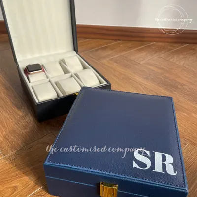 A timeless gift for the man who appreciates detail. Our personalized watch boxes, available for 2, 4, or 6 timepieces, are crafted from faux leather and can be monogrammed with his initials.