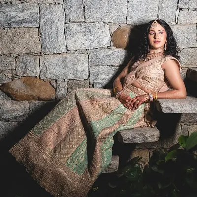 A stunning, artistic shot of a bride from her pre-wedding photoshoot. The makeup was designed to look beautiful in both natural and dramatic lighting.