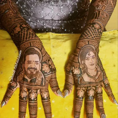 My portrait mehendi is one of my most requested services. Here, I've captured the likeness of the bride and groom on their respective palms, creating a truly personal and unforgettable piece of wedding art.