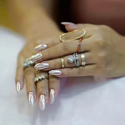 Nothing makes a statement like full chrome nails. This liquid-metal silver chrome finish is high-fashion, futuristic, and guaranteed to turn heads.