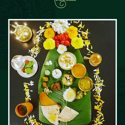 The tradition of eating on a 'keLichyA pAnAvar' (banana leaf) is central to Maharashtrian culture. Not only is it eco-friendly, but it also adds a subtle, fresh aroma to the food, enhancing the taste of the entire meal.